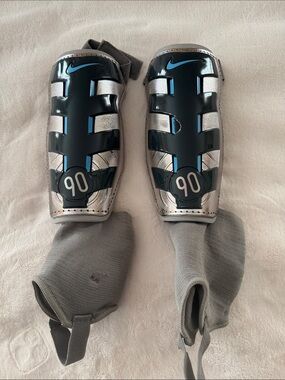 Nike Black & Silver Soccer Shin Guards with Blue Accents